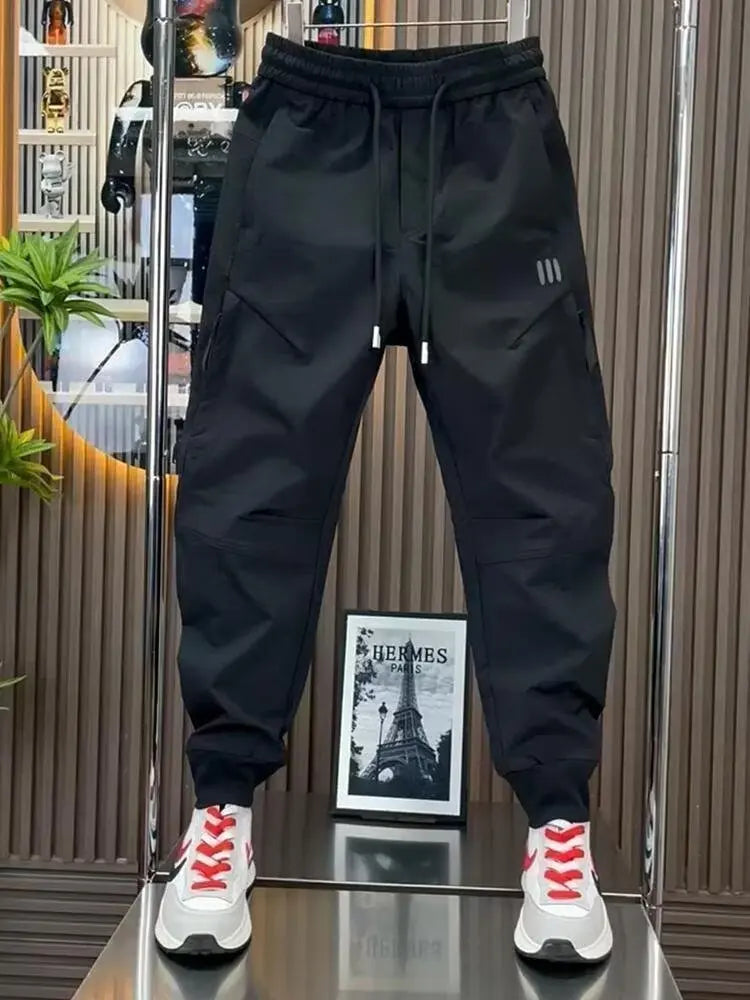 Spring new men's outdoor work pants loose fitting and trendy brand quick drying harem pants elastic waisted casual pants