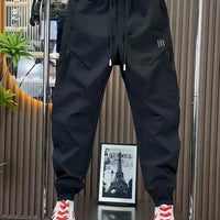 Spring new men's outdoor work pants loose fitting and trendy brand quick drying harem pants elastic waisted casual pants