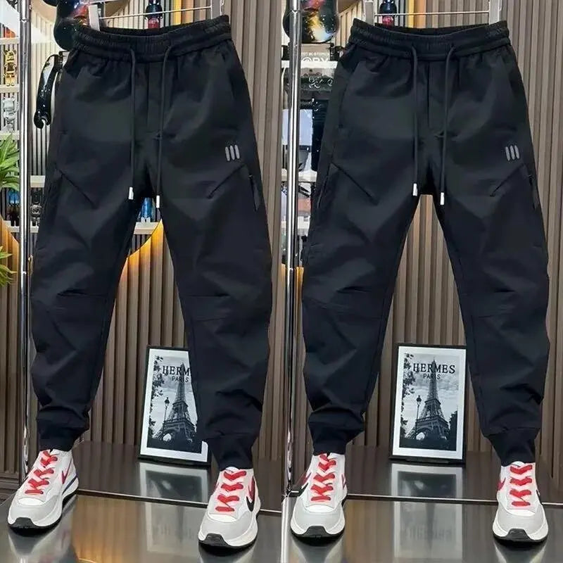 Spring new men's outdoor work pants loose fitting and trendy brand quick drying harem pants elastic waisted casual pants