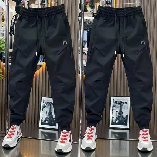 Spring new men's outdoor work pants loose fitting and trendy brand quick drying harem pants elastic waisted casual pants