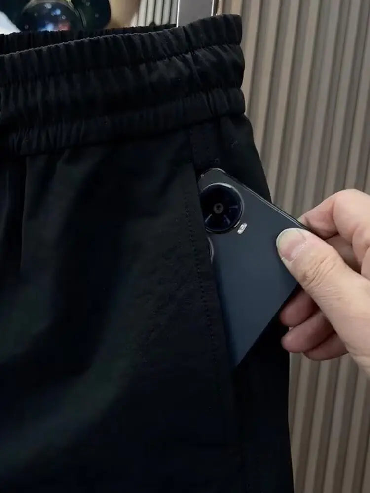 Spring new men's outdoor work pants loose fitting and trendy brand quick drying harem pants elastic waisted casual pants