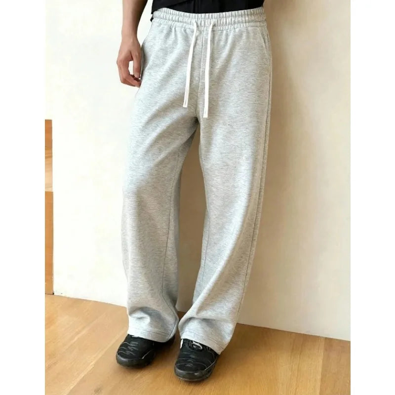 Men's casual solid-color stretch-drawstring sweatpants, loose-fitting jogging pants, perfect for all seasons, fall and winter.