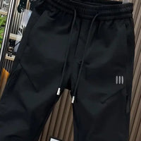 Spring new men's outdoor work pants loose fitting and trendy brand quick drying harem pants elastic waisted casual pants