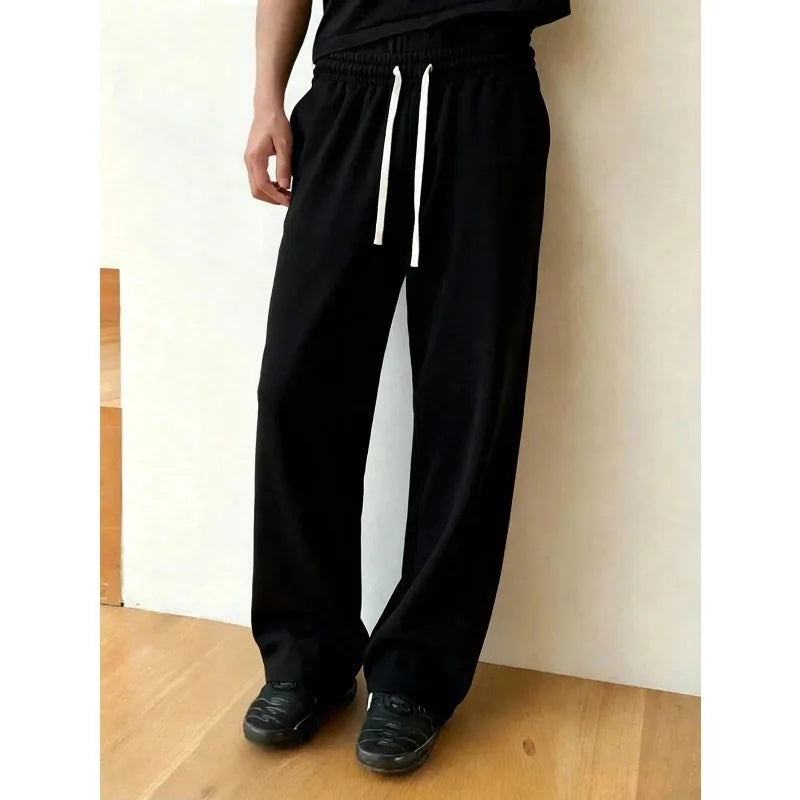 Men's casual solid-color stretch-drawstring sweatpants, loose-fitting jogging pants, perfect for all seasons, fall and winter.