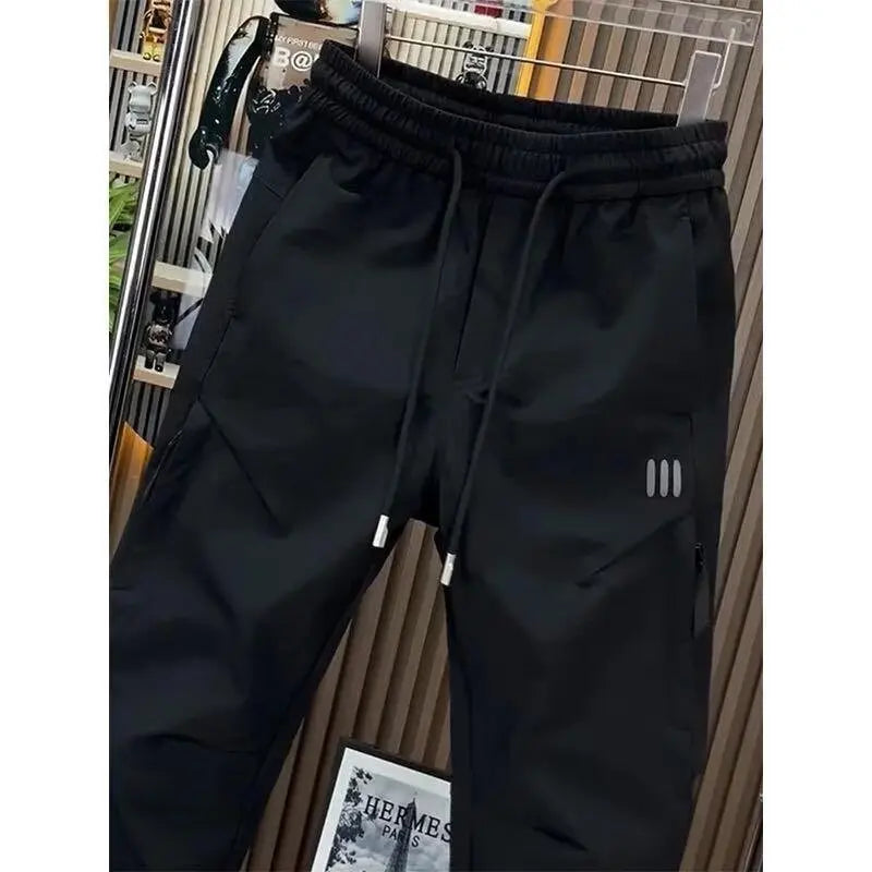 Spring new men's outdoor work pants loose fitting and trendy brand quick drying harem pants elastic waisted casual pants