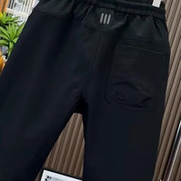 Spring new men's outdoor work pants loose fitting and trendy brand quick drying harem pants elastic waisted casual pants